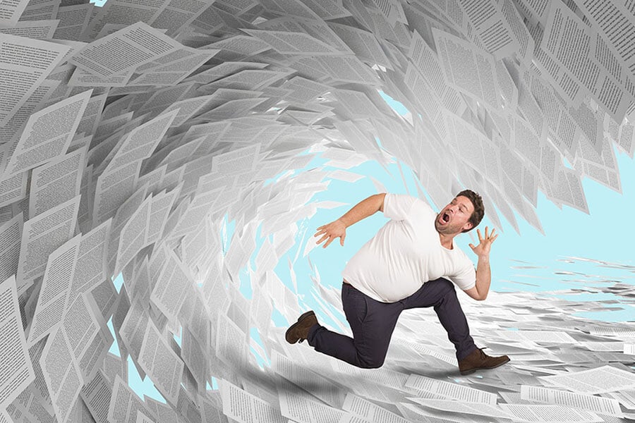 The central featured image shows a man being overwhelmed by a literal tsunami of paperwork, depicting what it feels like to comply with forms like the IT-2104.
